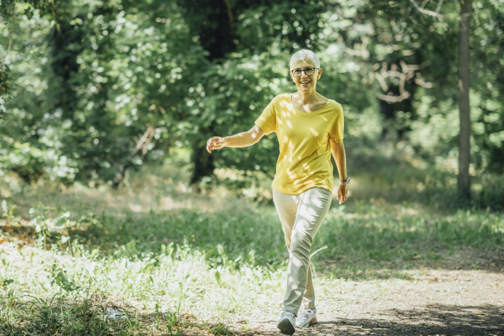 Intermittent Walking Workout, Mature Woman Exercising